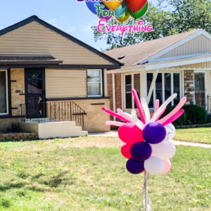 Colorful balloons outside the house